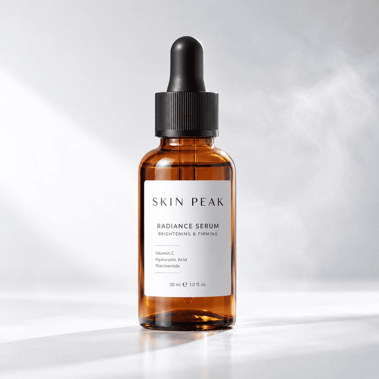 Amber glass product pack shot with rim light and mist